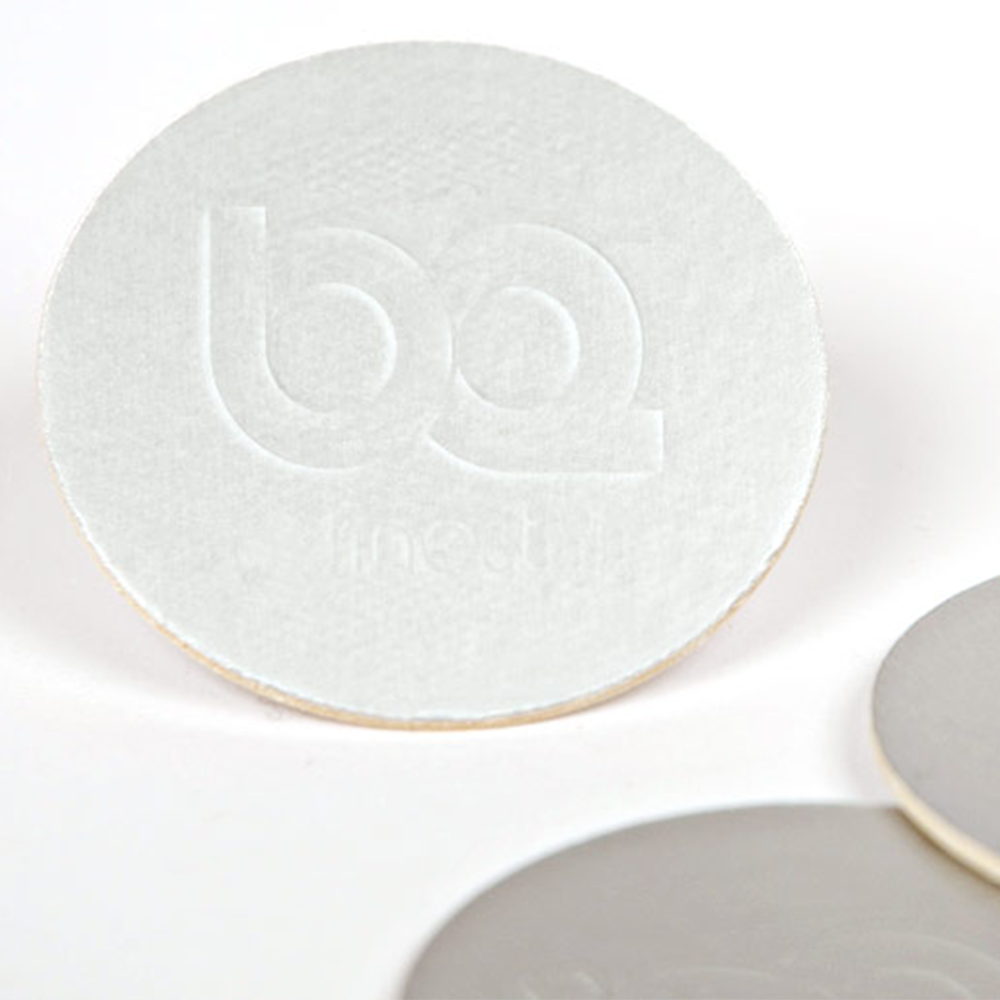 sealing foil with embossed logo